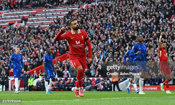 Mohamed Salah of Liverpool celebrating after scoring the opening goal during the Premier League match between Liverpool FC and Chelsea FC at Anfield...