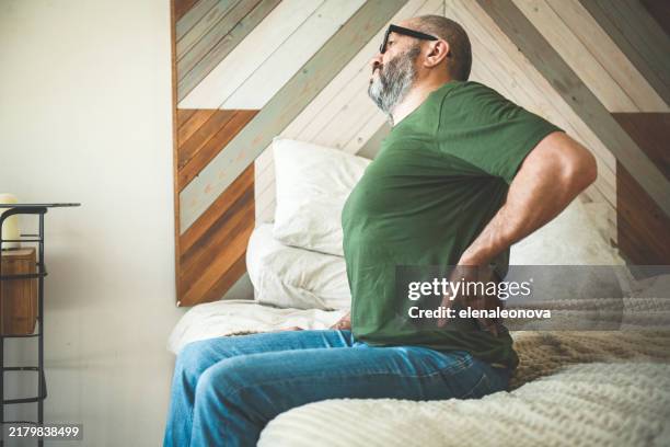 mature adult man ( illness, stomachache) - appendicitis stock pictures, royalty-free photos & images