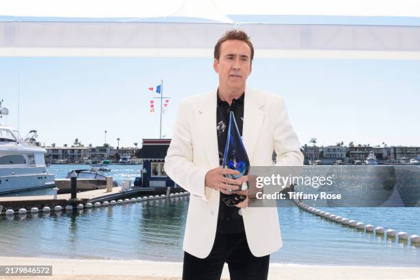 Nicolas Cage receives the 'Icon' award during the 25th Newport Beach Film Festival Honors Brunch on October 20, 2024 in Newport Beach, California.