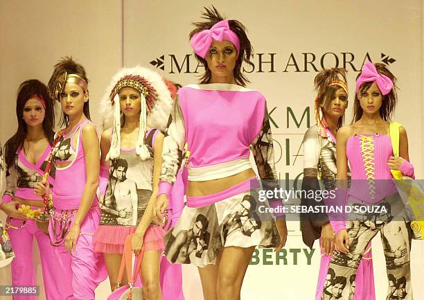 Indian models display creations by designer Manish Arora on the third day of the Lakme India Fashion Week in Bombay, 20 July 2003. The Fashion Week,...