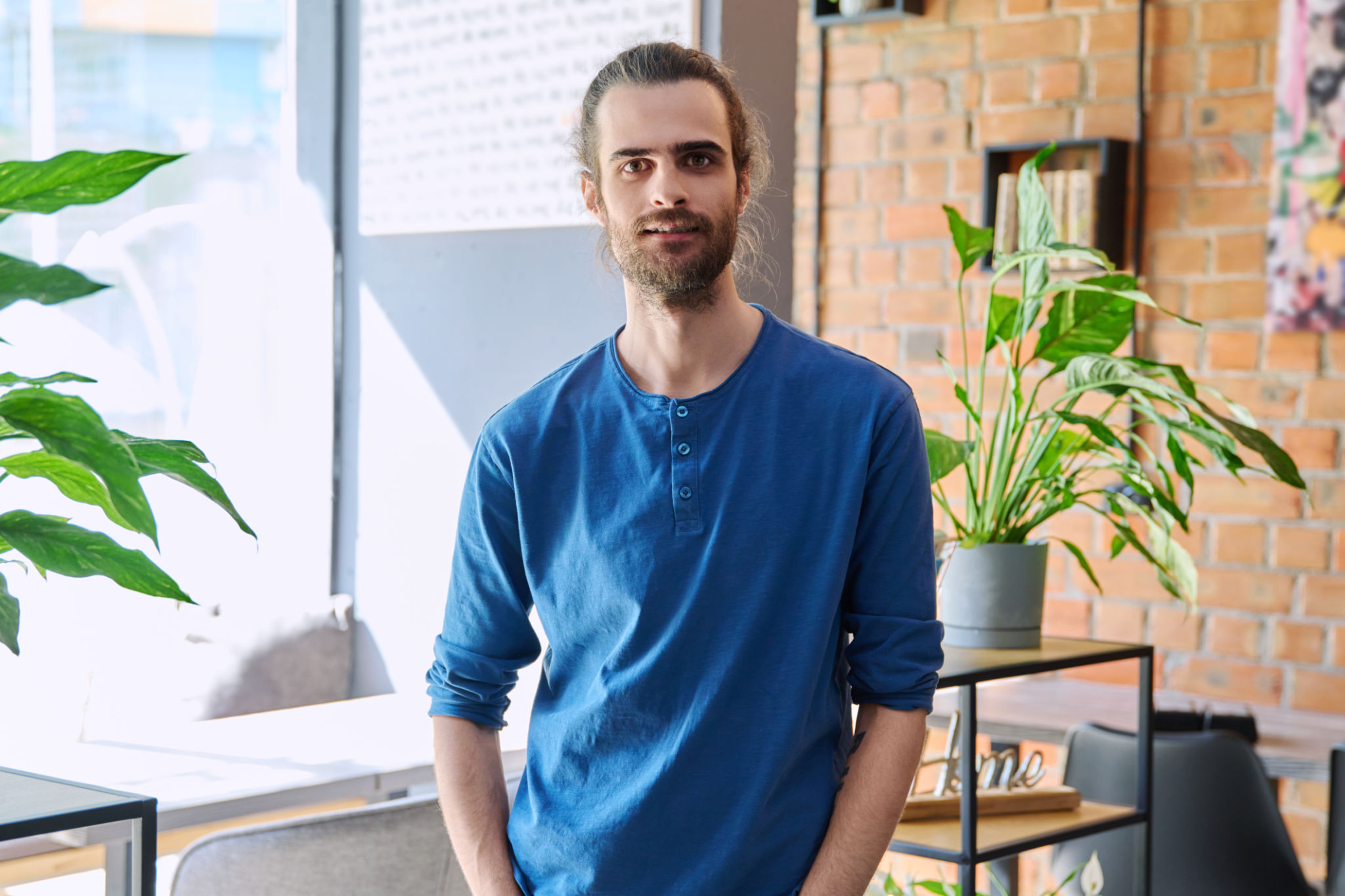 Portrait of young confident handsome man looking at camera Portrait of young confident handsome man looking at camera