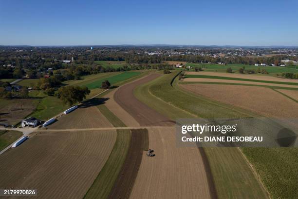 This aerial picture taken on October 17, 2024 shows a farm in Lancaster, Pennsylvania. The Amish people of Lancaster, Pennsylvania, are a throwback...