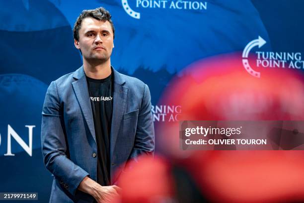 Conservative political activist Charlie Kirk, founder of Turning Point Action, speaks during a meeting on the campus of the University of Arizona in...