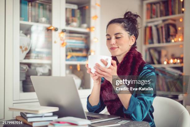 young woman at home - business online banking stock pictures, royalty-free photos & images