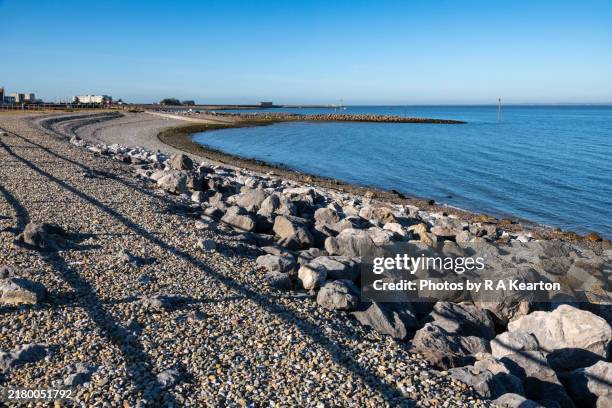 morecambe, lancashire, england - boulder retaining wall stock pictures, royalty-free photos & images
