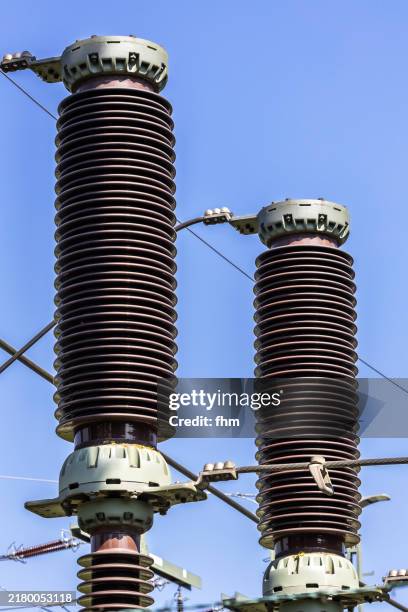 insulation at an electric transformer station - high voltage transformer stock pictures, royalty-free photos & images