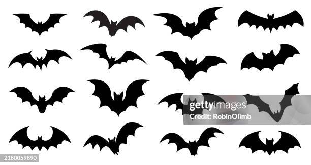 black vampire defeats silhuettes - vampire bat stock illustrations