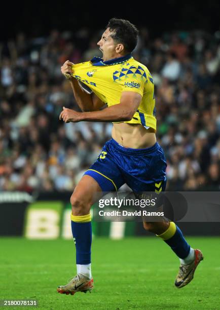 Alex Munoz of UD Las Palmas celebrates scoring his team's first goal during the LaLiga match between Valencia CF and UD Las Palmas at Estadio...