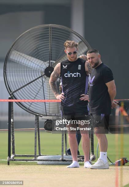 England captain Ben Stokes and coach Brendon McCullum inspect the pitch as giant fans blow air during nets ahead of the 3rd Test Match between...
