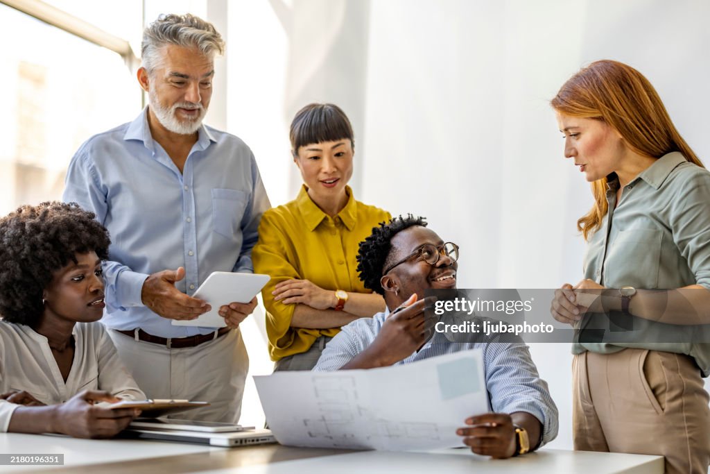 Diverse Team Collaborating During a Successful Business Meeting