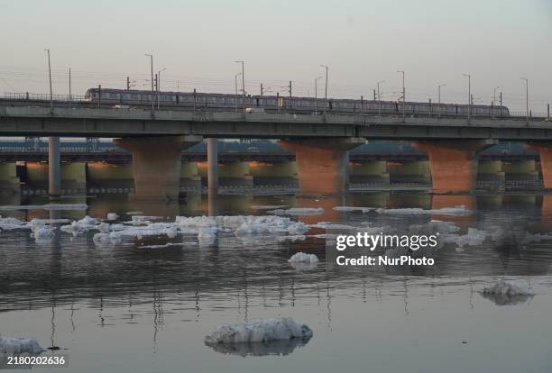 Toxic frothing is seen in the Yamuna River at Kalindi Kunj in New Delhi, India, on October 25, 2024.