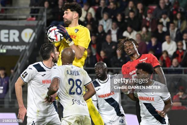 Le Havre's French goalkeeper Arthur Desmas grabs the ball during the French L1 football match between Stade Rennais FC and Le Havre AC at Roazhon...