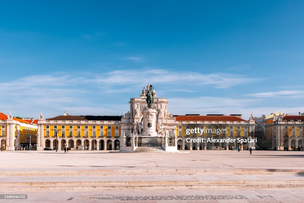 Praca do Comerco square and Rua Augusta Arch on a sunny day with clear blue sky, Lisbon, Portugal