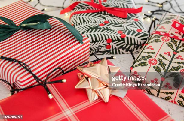 christmas presents - christmas wrapping paper stock pictures, royalty-free photos & images