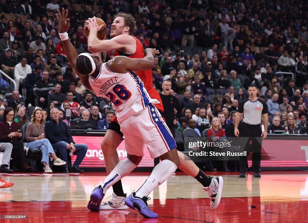Toronto Raptors Centre TORONTO, ON - OCTOBER 25 - Toronto Raptors center Jakob Poeltl powers ...