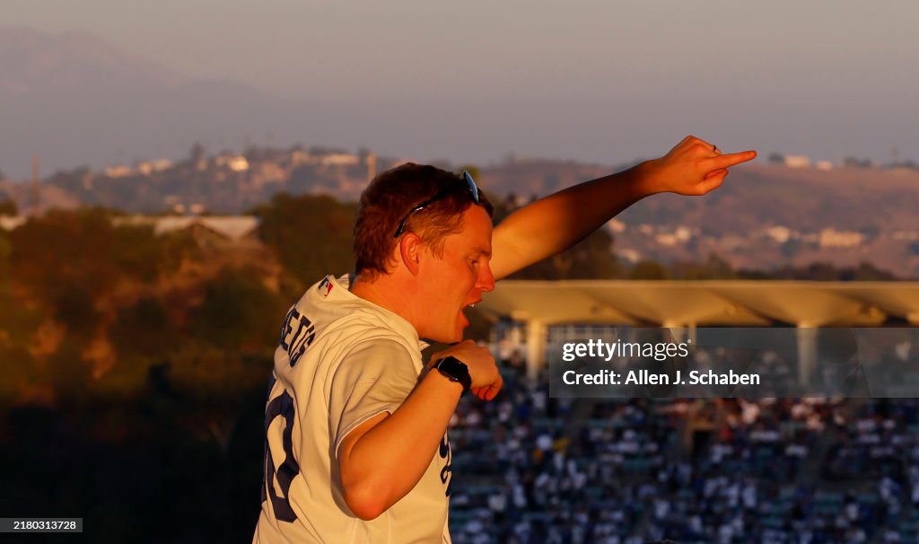 Dodgers fans honor the life of the late Dodgers star Fernando Valenzuela at a memorial outside Dodger Stadium