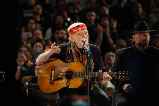 Country music star Willie Nelson performs at a campaign rally for Democratic presidential nominee, Vice President Kamala Harris, on October 25, 2024...