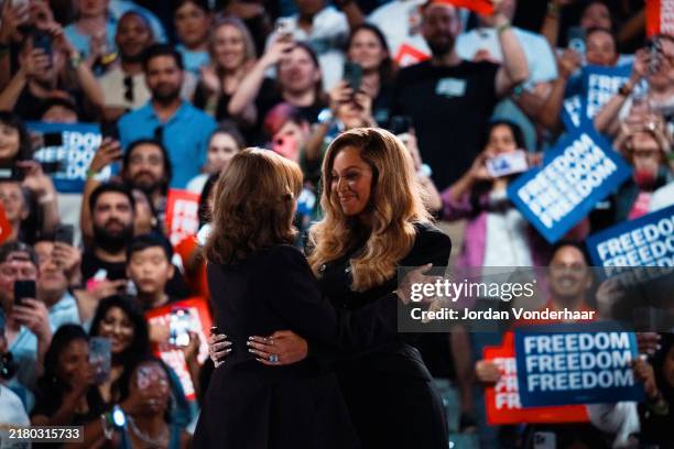 Democratic presidential nominee, Vice President Kamala Harris embraces singer Beyoncé at a campaign rally on October 25, 2024 in Houston, Texas....