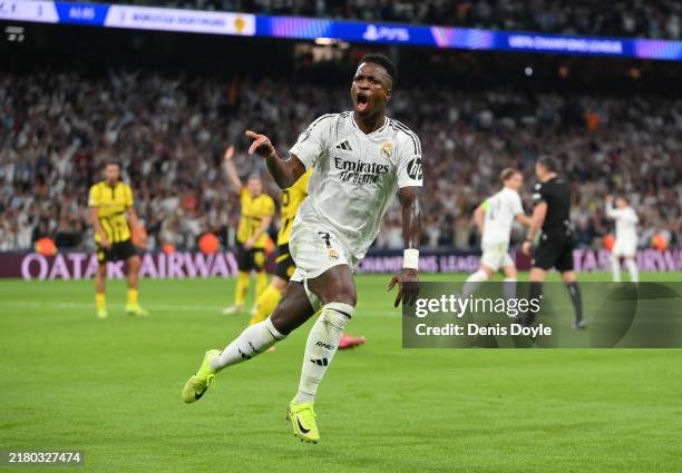 Vinicius Junior of Real Madrid celebrates scoring his team's second goal during the UEFA Champions League 2024/25 League Phase MD3 match between Real...