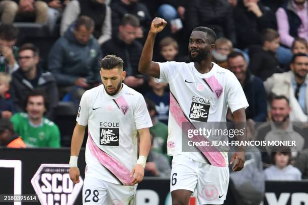 Angers' Ivorian midfielder Jean-Eudes Aholou celebrates after scoring his team's second goal during the French L1 football match between SCO Angers...