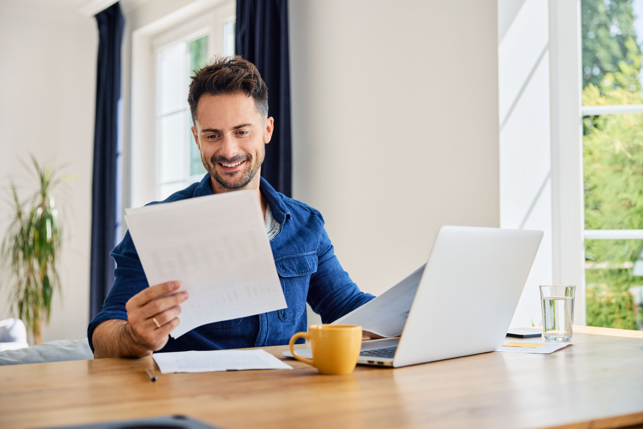homeowner reading paper