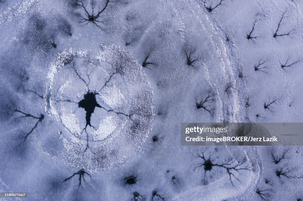 Drone view. Abstract forms created on surface of freezing lake