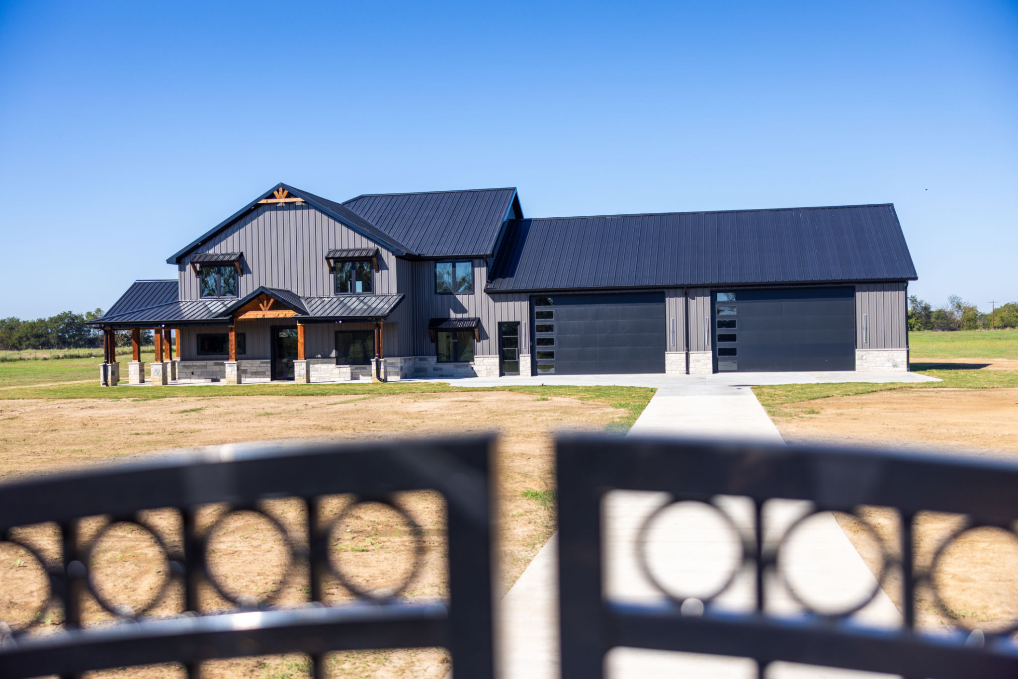 Exterior image of a Modern Luxury Home with gate Exterior image of a Modern Luxury Home with gate