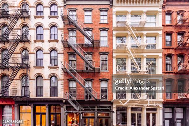 historic residential apartment buildings in tribeca district, front view, new york city, usa - manhattan imagens e fotografias de stock