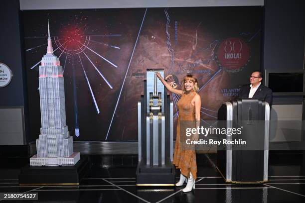 Maria Becerra poses as Maria Becerra and Sheila E. Light the Empire State Building in Celebration of HOLA! Magazine's 80th Anniversary at The Empire...