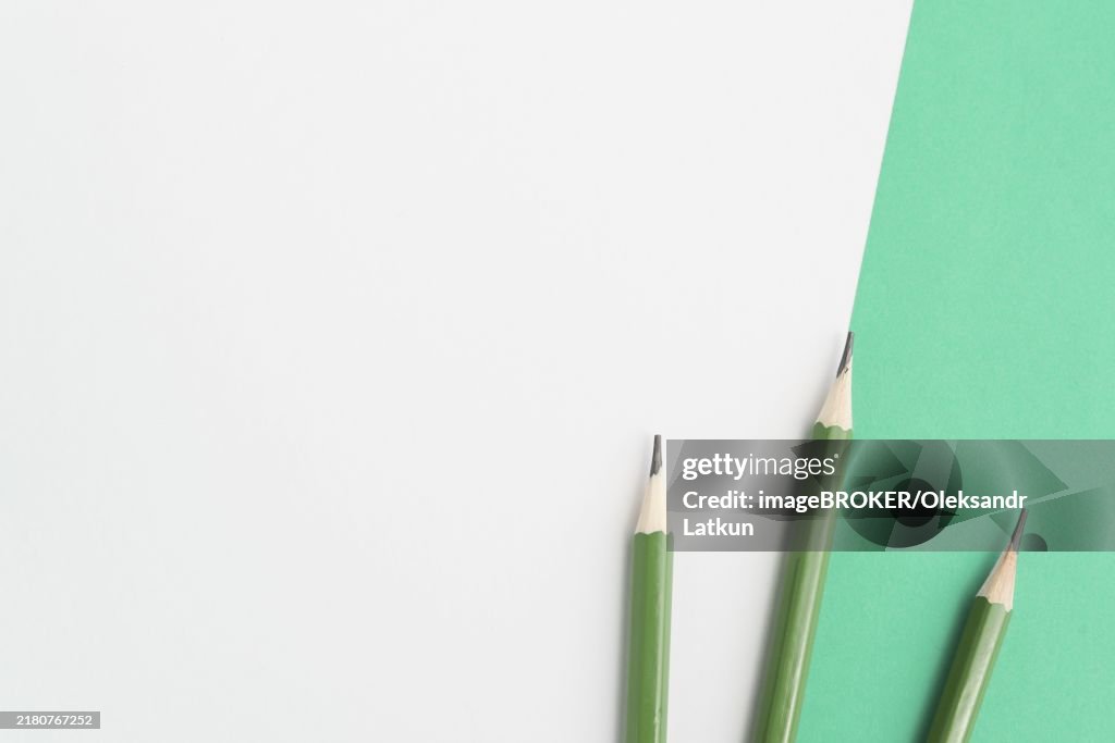 Green sharp pencils dual background