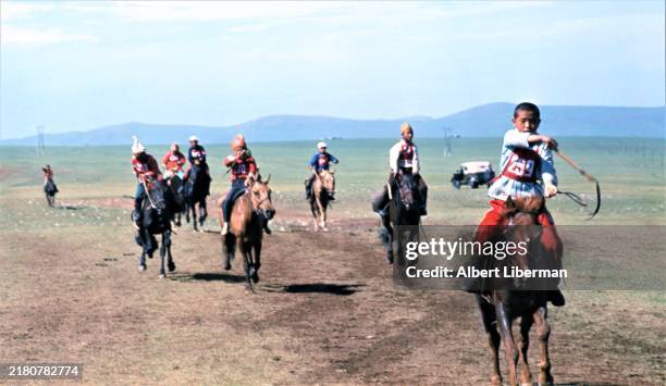 Horse racing, during the traditional Mongolian festival Naadam. Nadaam has three competitive men's games; wrestling, horse racing and archery. The...