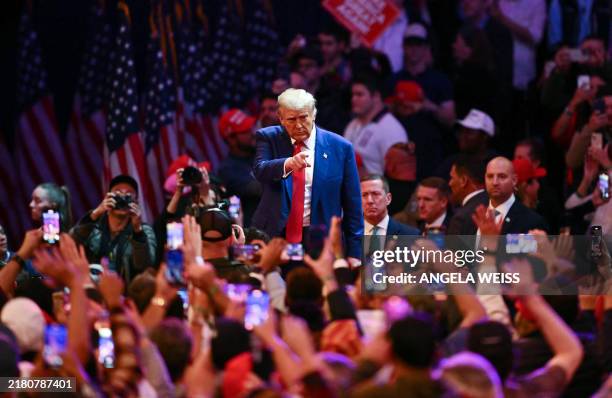 Former US President and Republican presidential candidate Donald Trump leaves a campaign rally at Madison Square Garden in New York, October 27, 2024.