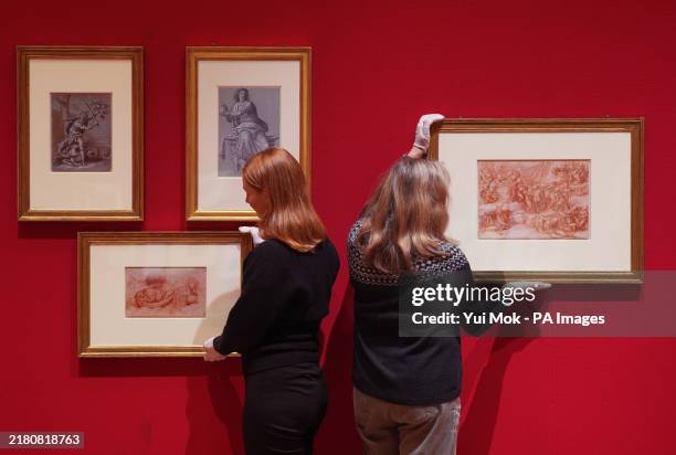 Highly finished 'presentation drawing' of a bacchic scene in red chalk by Michelangelo Buonarroti , A Children's Bacchanal is hung alongside a red...
