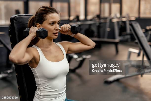 motivation determines what you do - weight training stock pictures, royalty-free photos & images