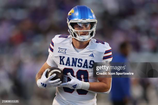 Kansas Jayhawks running back Carson Morgan runs with the ball before a Big 12 game between the Kansas Jayhawks and Kansas State Wildcats on October...