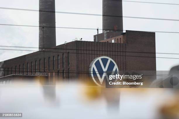 Logo on a building at the Volkswagen AG headquarters and auto plant complex in Wolfsburg, Germany, on Monday, Oct. 28, 2024. Volkswagen AG workers...