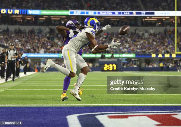 Demarcus Robinson of the Los Angeles Rams makes a touchdown pass reception against Shaquill Griffin of the Minnesota Vikings in the third quarter at...