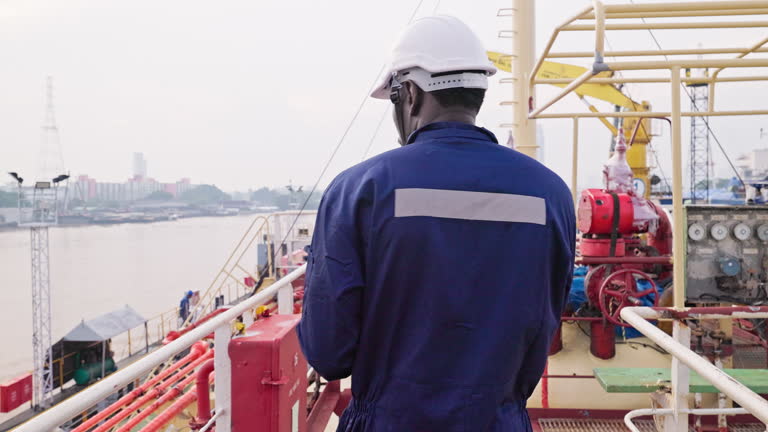 https://media.gettyimages.com/id/2180896407/video/engineer-crew-working-on-oil-ship-tanker-desk-for-business-logistics-import-export-shipping.jpg?b=1&s=640x640&k=20&c=5KarOXr2g0whghB0EyAvhQVrJYGaMGBGCw9CqGr0pT4=