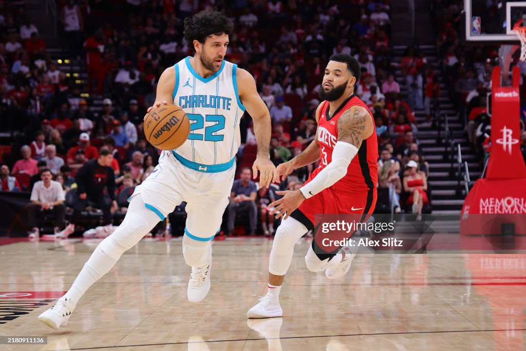 Hornets Rockets 2002 Vasilije Micic of the Charlotte Hornets dribbles past Fred VanVleet ...