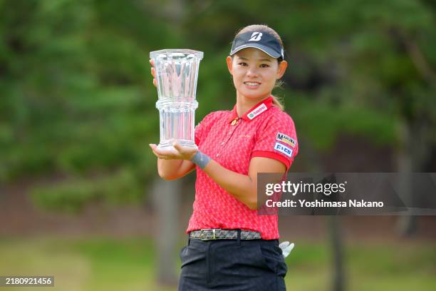 Ayame Morii of Japan poses with the trophy after winning the tournament folloiwng the final round of HILLS Ladies MORI BUILDING CUP at Shishido Hills...