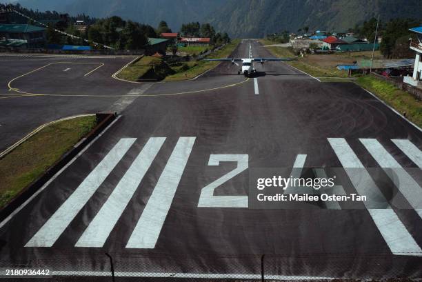 Small aircraft arrives at Lukla airport, often cited as the most dangerous airstrip in the world, on October 16, 2024 in Lukla, Nepal. Trekkers...
