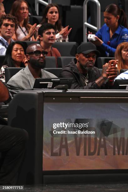 Dwyane Wade and Udonis Haslem attend the game between the Detroit Pistons and the Miami Heat on October 28, 2024 at Kaseya Center in Miami, Florida....
