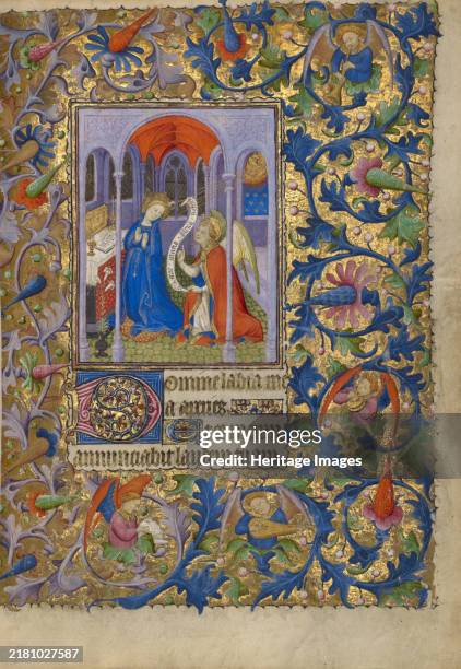 The Annunciation, circa 1410. Additional Info:This sumptuous page, whose border features a shimmering background of gold, music-making angels, and...