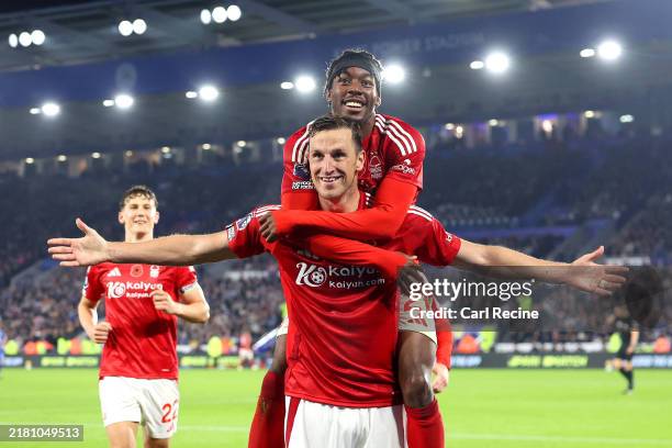 Chris Wood of Nottingham Forest celebrates with teammate Anthony Elanga after scoring his team's third goal during the Premier League match between...