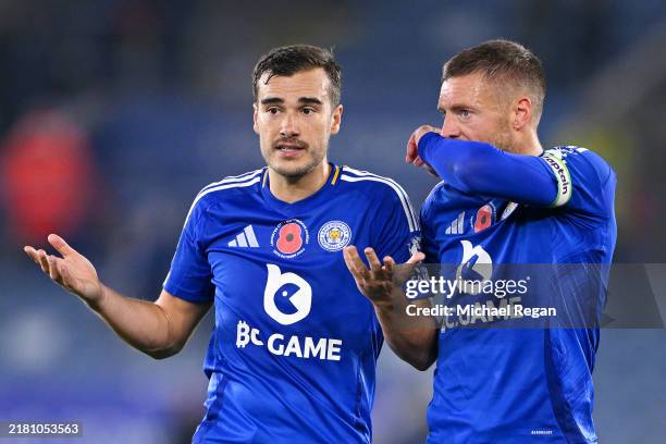 Jamie Vardy of Leicester City speaks to teammate Harry Winks at the end of the Premier League match between Leicester City FC and Nottingham Forest...