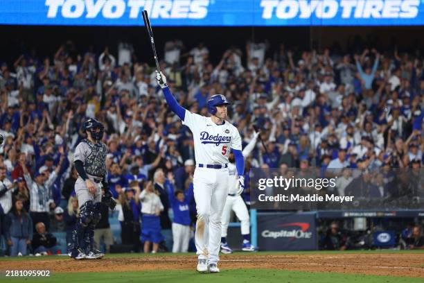 Freddie Freeman of the Los Angeles Dodgers celebrates after hitting a walk-off grand slam during the tenth inning against the New York Yankees during...