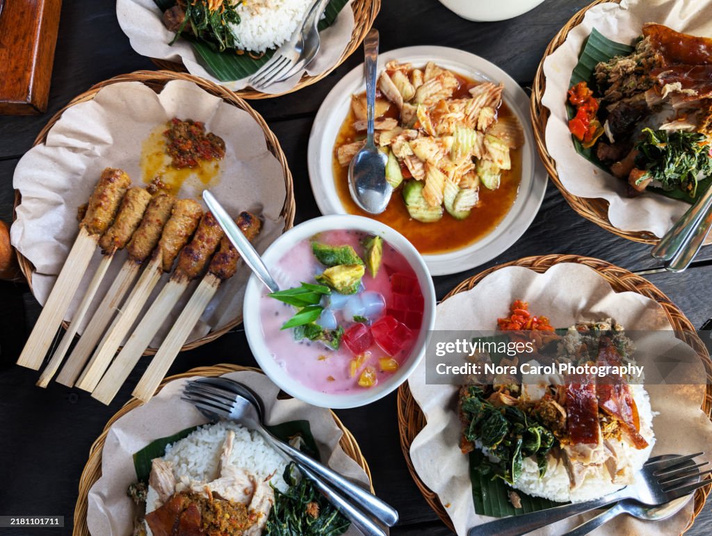High Angle View of Babi Guling Rice, Es Teler, Pork Satayr and Fruit Rojak