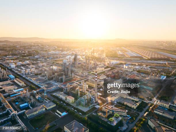 petrochemical plant at sunset - industrial district stock pictures, royalty-free photos & images