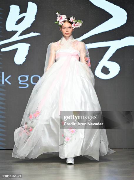 Model walks the runway at the Hanbok Goong show during Vancouver Fashion Week SS 2025 - Day 4 at Chinese Cultural Centre Museum on October 25, 2024...