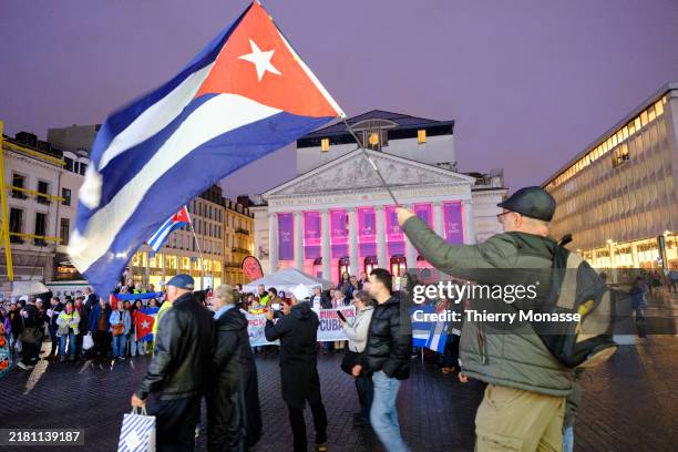 Around 70 people take part in a demonstration in 'Place de la Monnaie' for the lifting of the blockade against Cuba on October 29, 2024 in Brussels,...